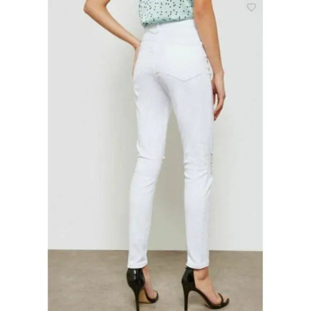 Topshop 'Jamie' Ripped Knee Skinny Jeans - size 28 in White. - Picture 2 of 14